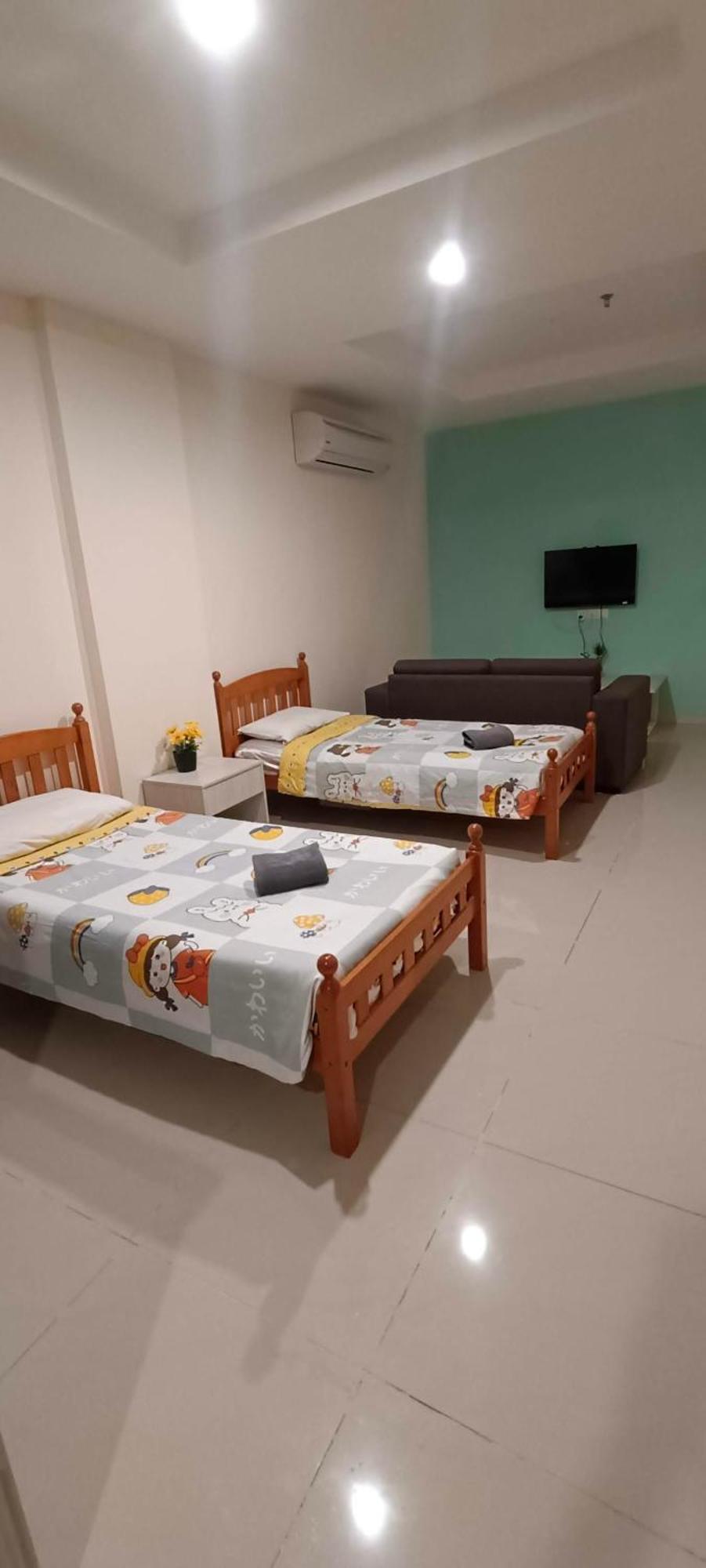 Glossy Marina Homestays Lumut Eksteriør billede